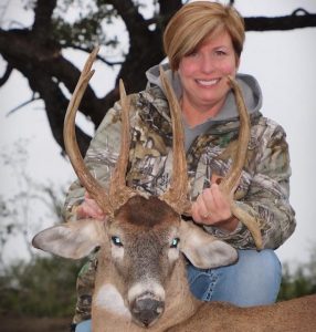 female hunter deer kill, unique antlers