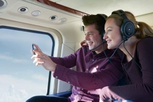 people taking selfie in helicopter | Hooville Ranch hunting and lodging