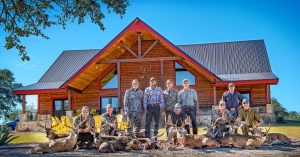 famous hunting party of nine and their kills | Hooville Ranch hunting and lodging