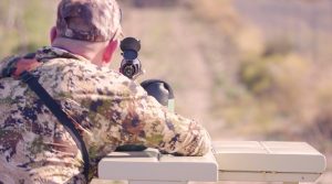 hunter practicing with rifle | Hooville Ranch hunting and lodging